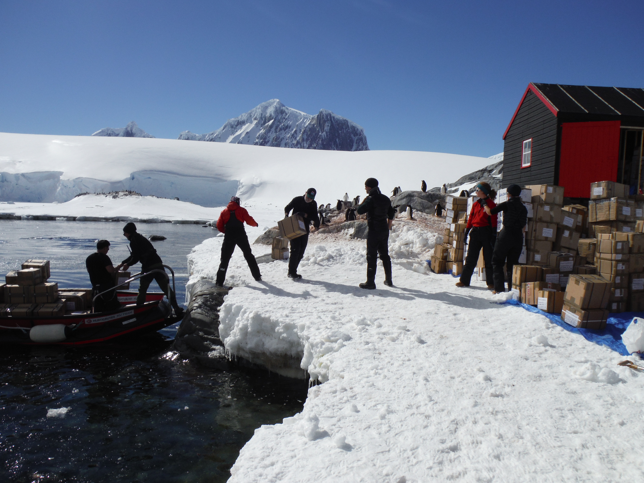 People unloading cargo