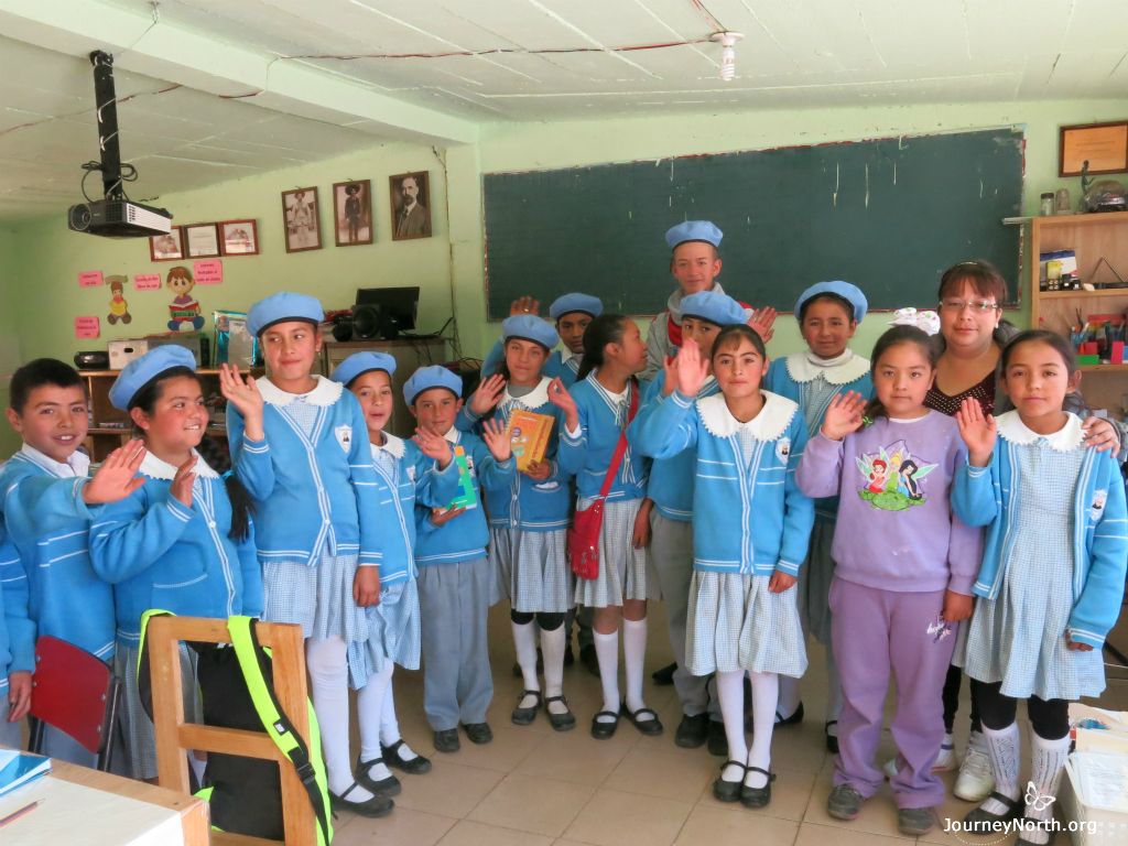 children receive symbolic monarchs in Mexico
