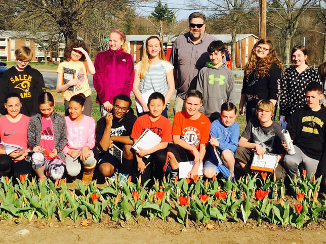 Image of students in tulip garden at Woodbury School in 2016