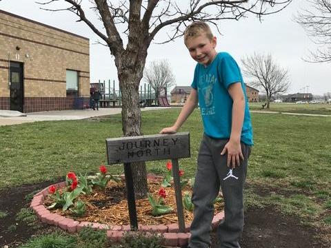 Photo of a student in the garden