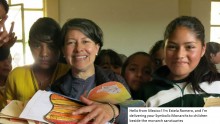 Estela Romero with students delivering Symbolic Monarchs