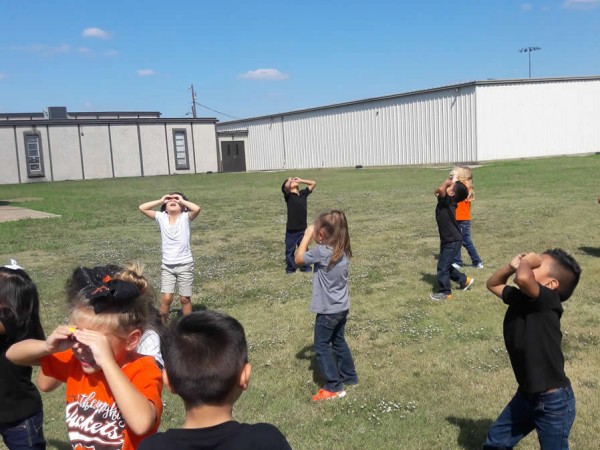 Students watching for migrating Monarch Butterflies in Texas