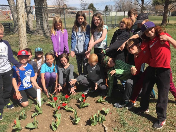 Students in the blooming garden.