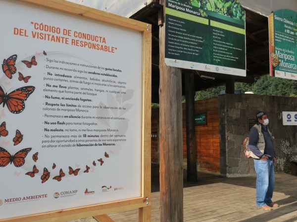 Sign of code of conduct for visitors at El Rosario Sanctuary