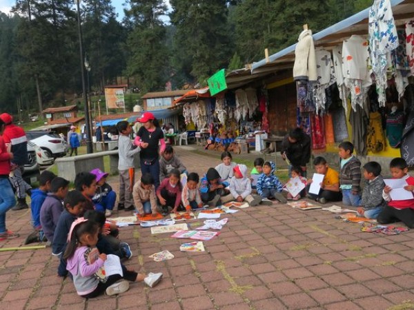 families working at El Rosario Sanctuary receive Ambassador Butterflies