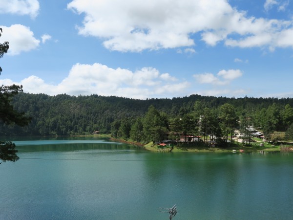 A Michoacán landscape with blue sky and blue water reservoir